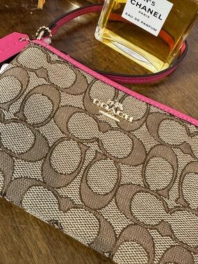 Coach Brown Signature Wristlet with Pink Trim and Strap